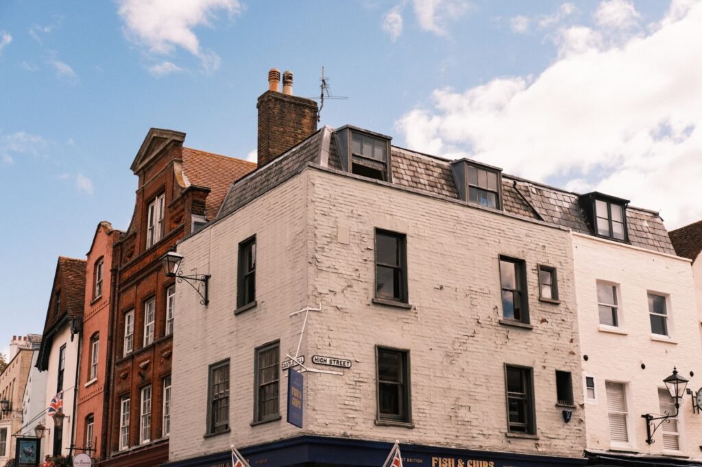 Charming historic buildings on High Street in London, showcasing classic architecture.