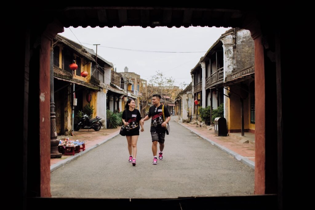Two adults walking together through a historic York street